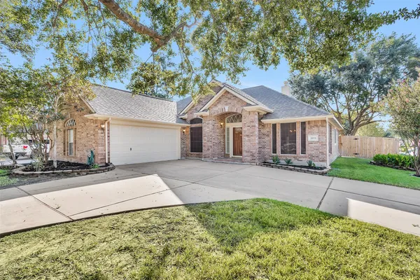 front view of a house with a small yard