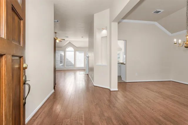 a view of entryway with wooden floor