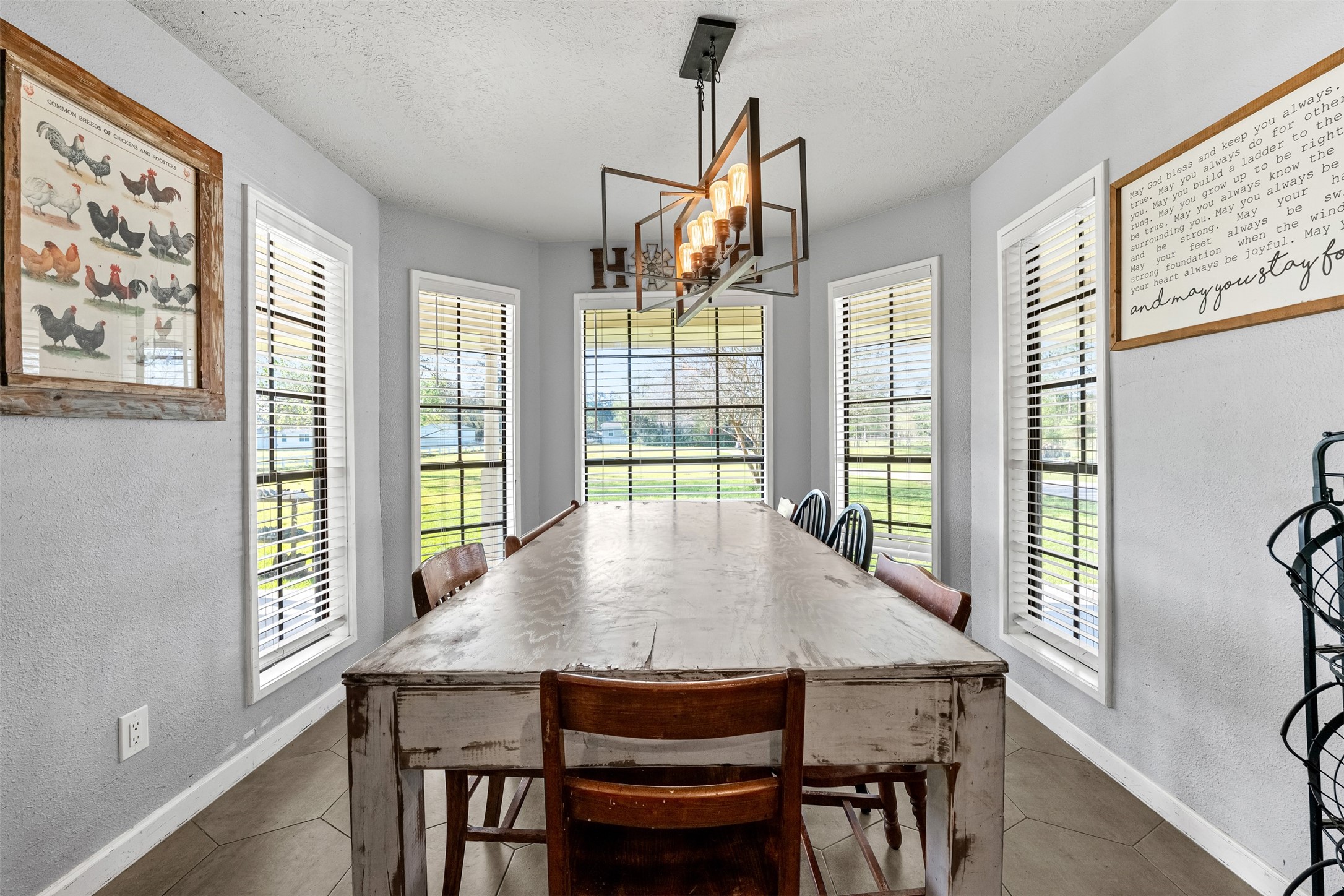 26515 Dobbin-Huffsmith Road Magnolia, TX 77354 - Photo 14 of 47 a view of a dining room with furniture window and outside view