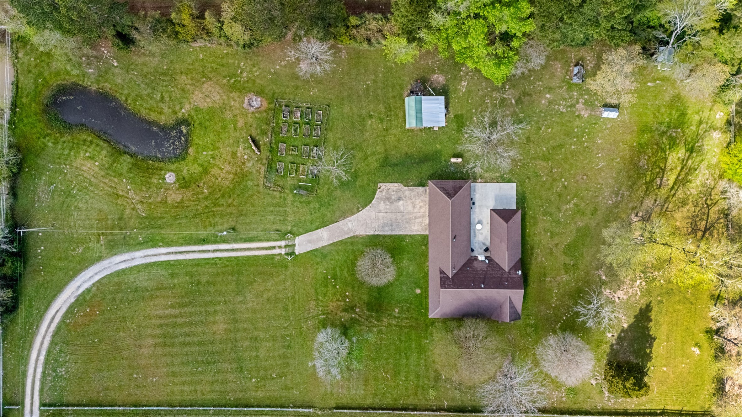 26515 Dobbin-Huffsmith Road Magnolia, TX 77354 - Photo 4 of 47 a view of a swimming pool with a yard