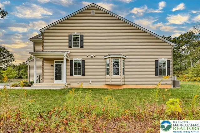 a front view of house with yard