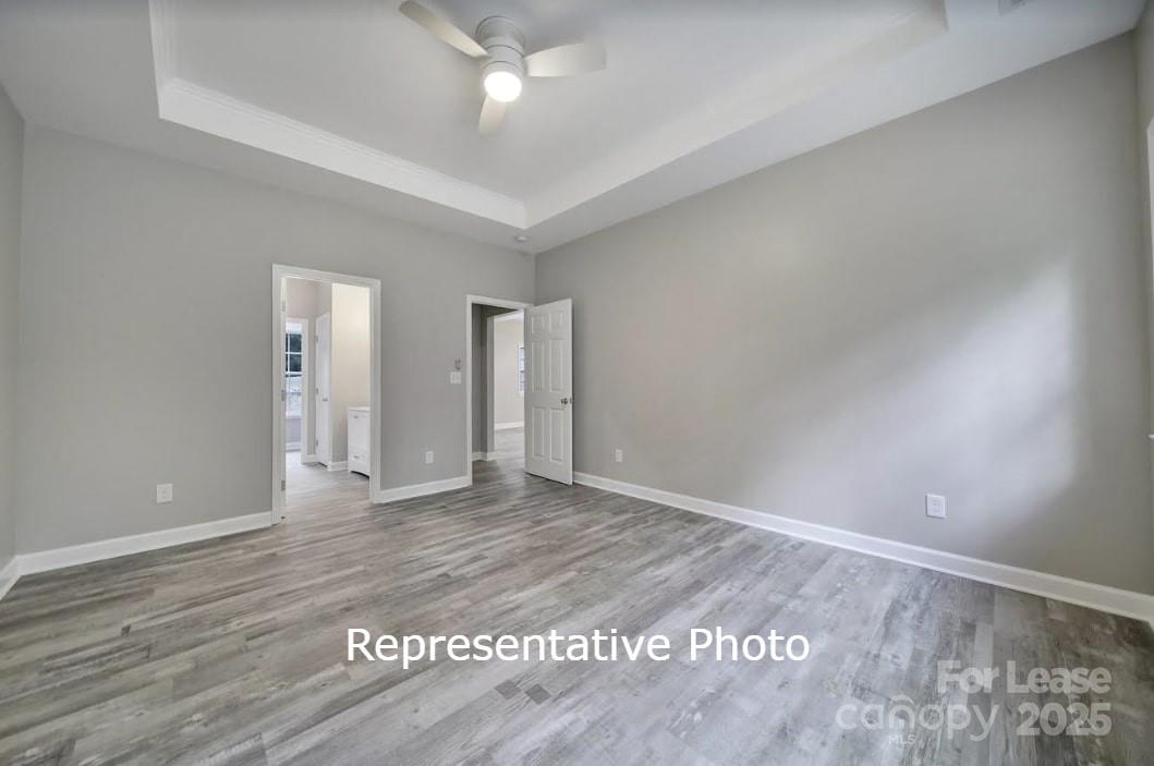 595 Foxwood Drive Southeast Concord, NC 28025 - Photo 5 of 8 wooden floor in an empty room
