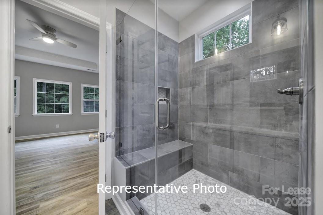 595 Foxwood Drive Southeast Concord, NC 28025 - Photo 7 of 8 a bathroom with a shower