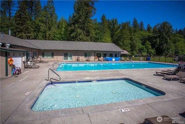 an outdoor space with lounge chair