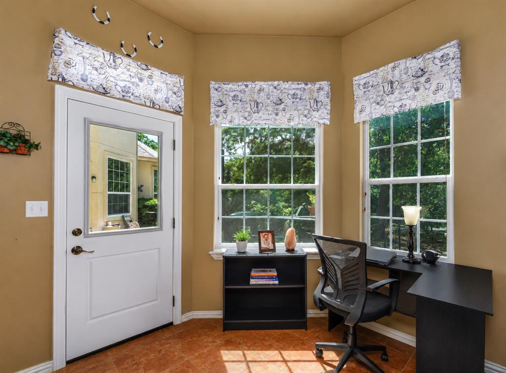 100 Manders Court Runaway Bay, TX 76426 - Photo 18 of 33 a view of a workspace with furniture and a window