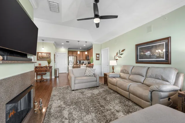 a kitchen with a stove a sink and a microwave