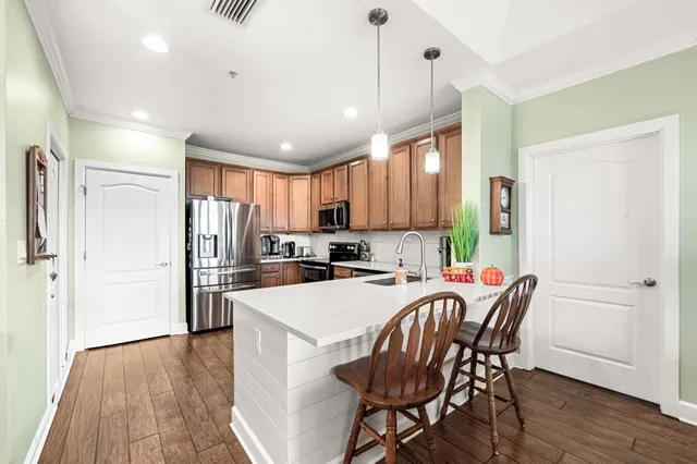 a shelf with books and knick knacks on it
