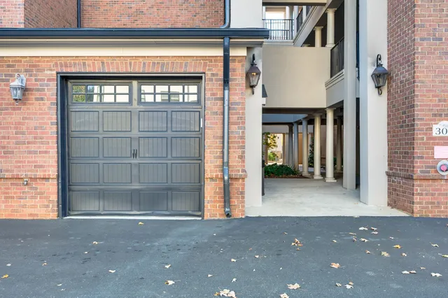 a city view with tall buildings and a yard
