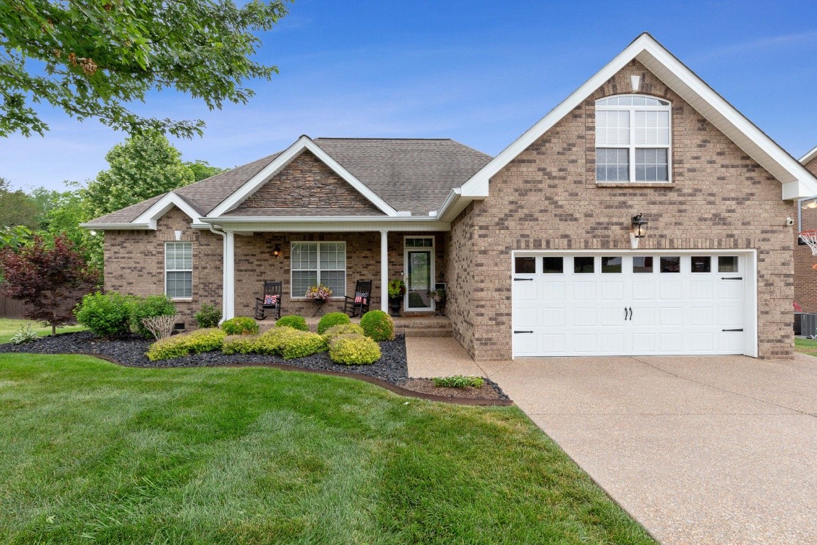 52 Abbey Road Lebanon, TN 37090 - Photo 1 of 40 a front view of a house with garden and porch