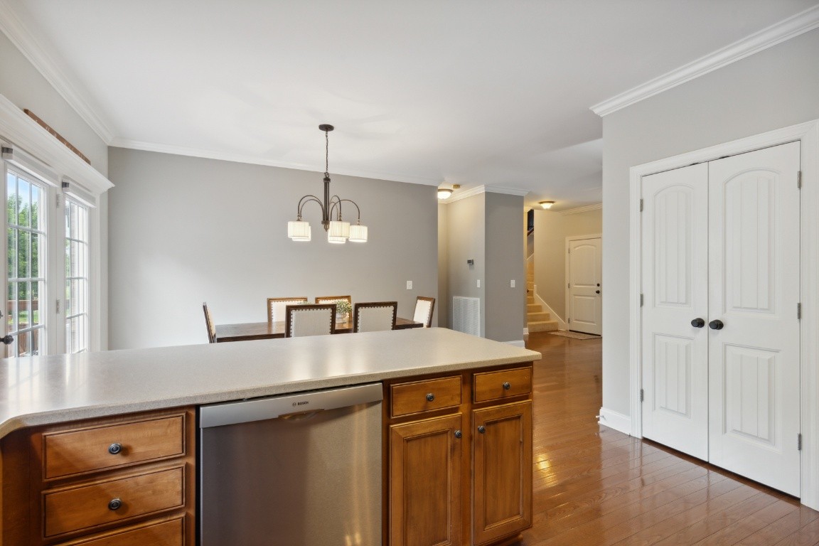 52 Abbey Road Lebanon, TN 37090 - Photo 15 of 40 a kitchen with stainless steel appliances granite countertop a sink a stove and a wooden floors