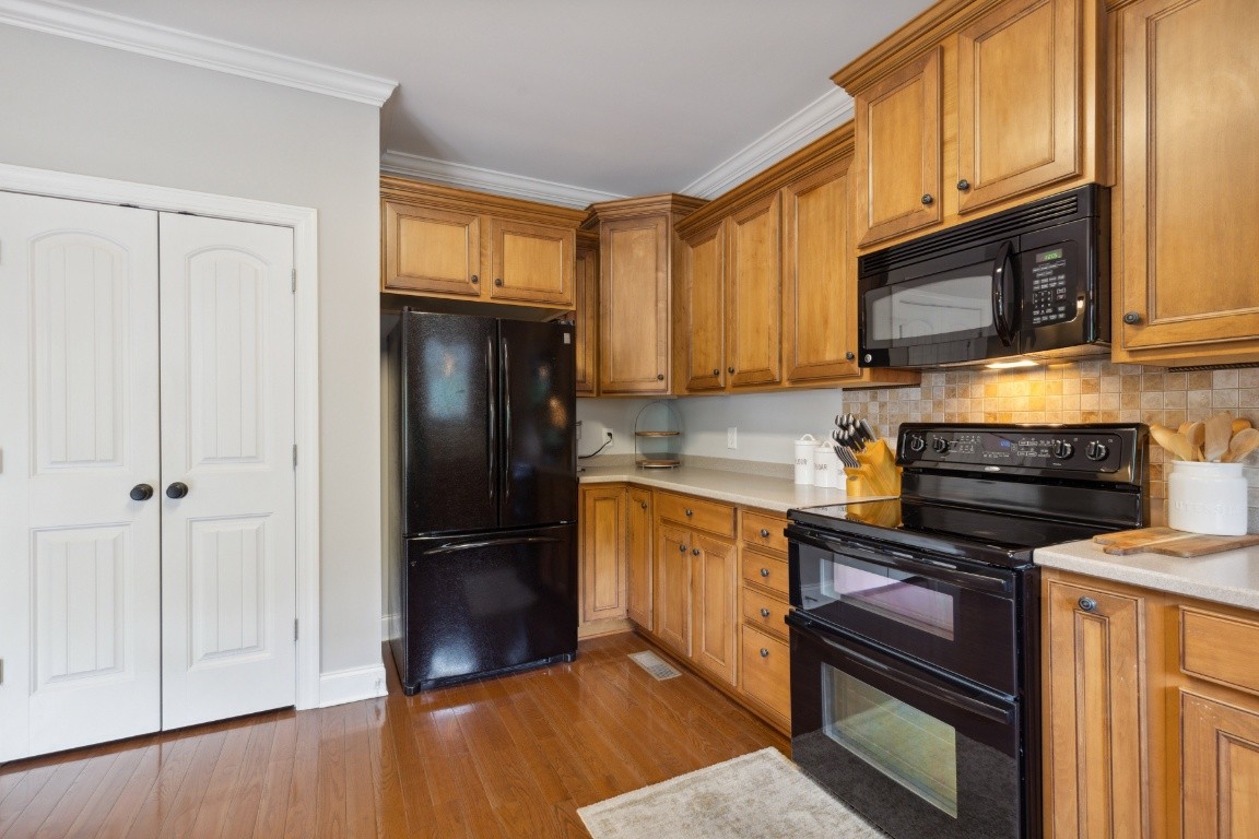 52 Abbey Road Lebanon, TN 37090 - Photo 16 of 40 a kitchen with stainless steel appliances granite countertop a refrigerator stove and sink