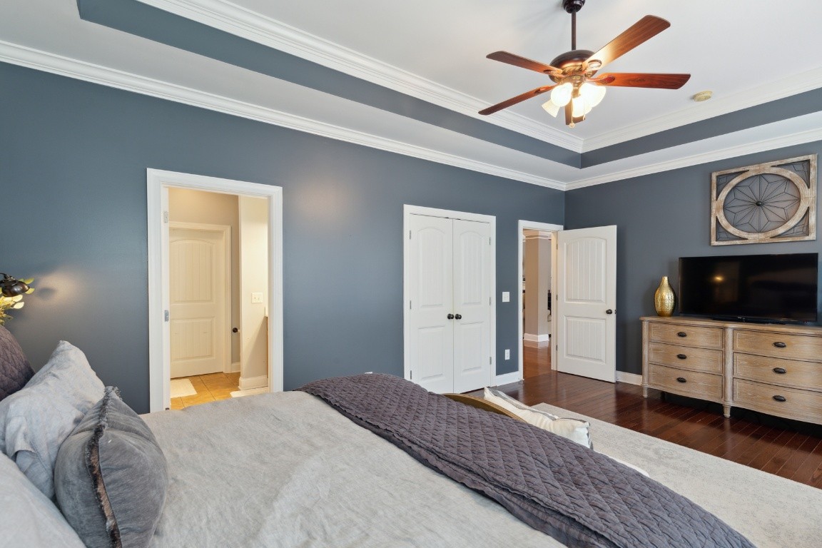 52 Abbey Road Lebanon, TN 37090 - Photo 23 of 40 a bedroom with a bed a flat screen tv and dresser