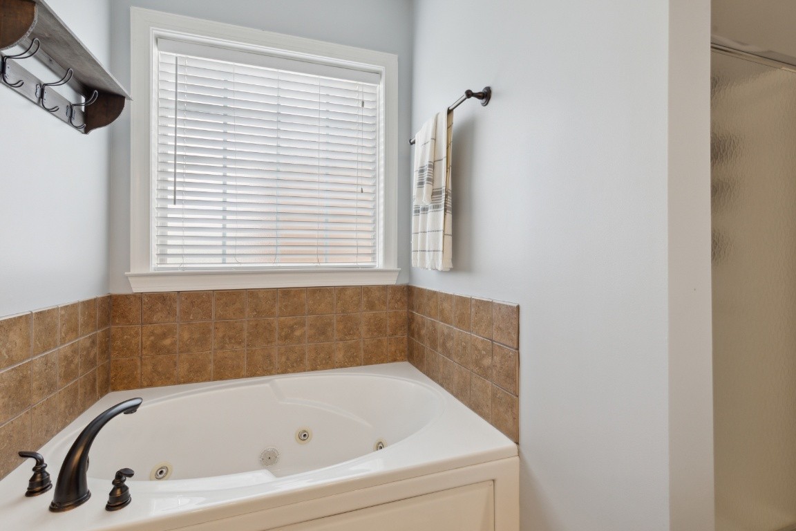 52 Abbey Road Lebanon, TN 37090 - Photo 25 of 40 a bathroom with a tub and a window