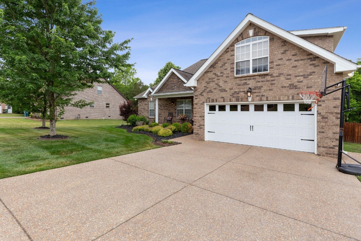 52 Abbey Road Lebanon, TN 37090 - Photo 3 of 40 a front view of a house with a yard