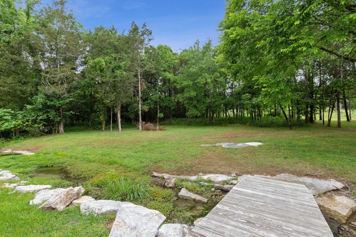 52 Abbey Road Lebanon, TN 37090 - Photo 36 of 40 a backyard of a house with lots of green space