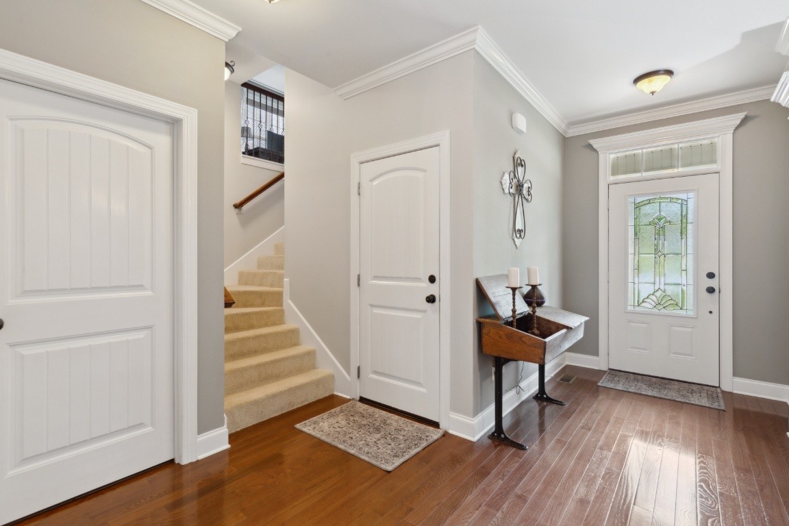 52 Abbey Road Lebanon, TN 37090 - Photo 4 of 40 a view of a room with wooden floor stairs and windows