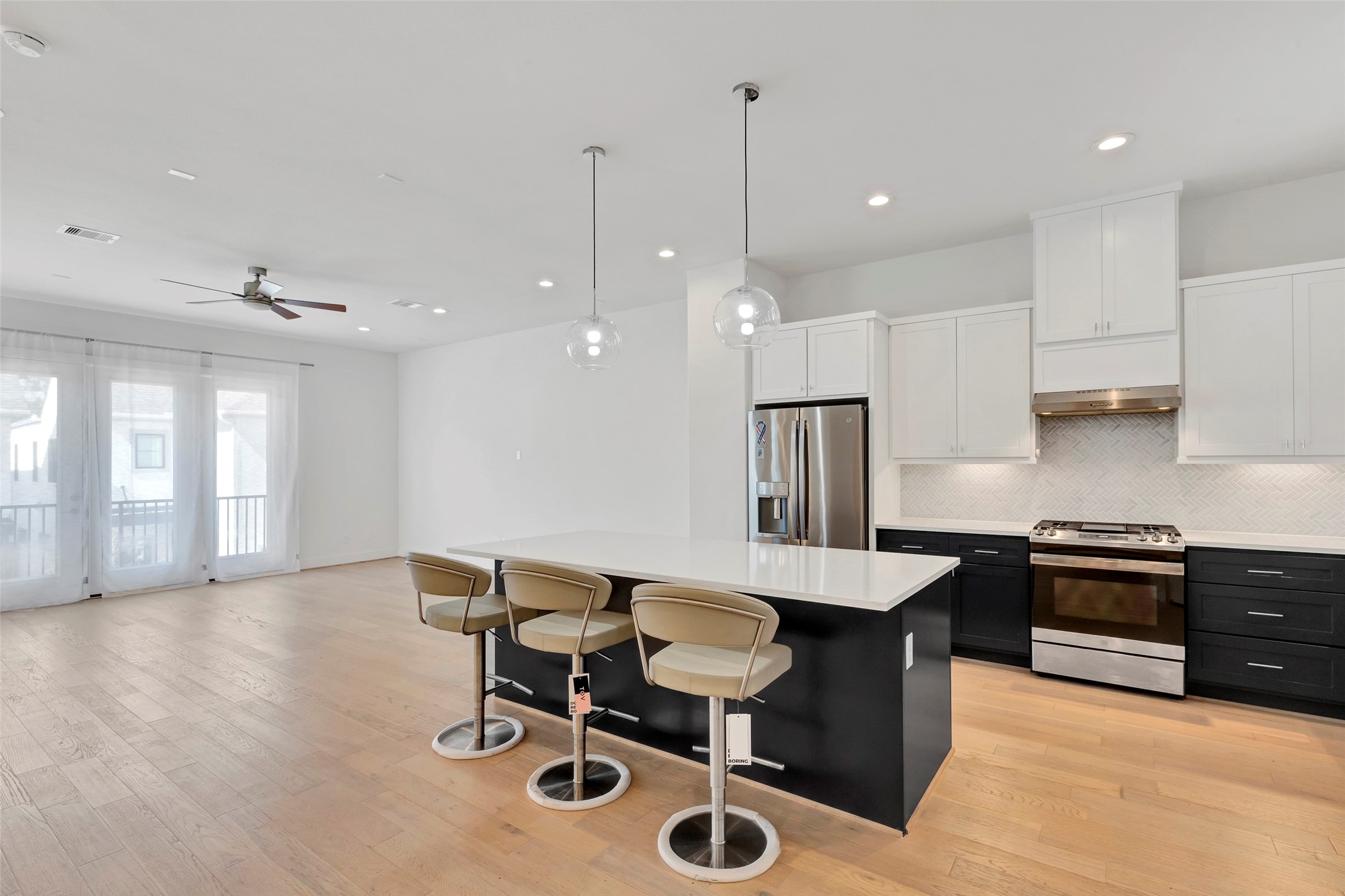 1740 Ojeman Point Lane Houston, TX 77055 - Photo 15 of 20 a large kitchen with a table and chairs