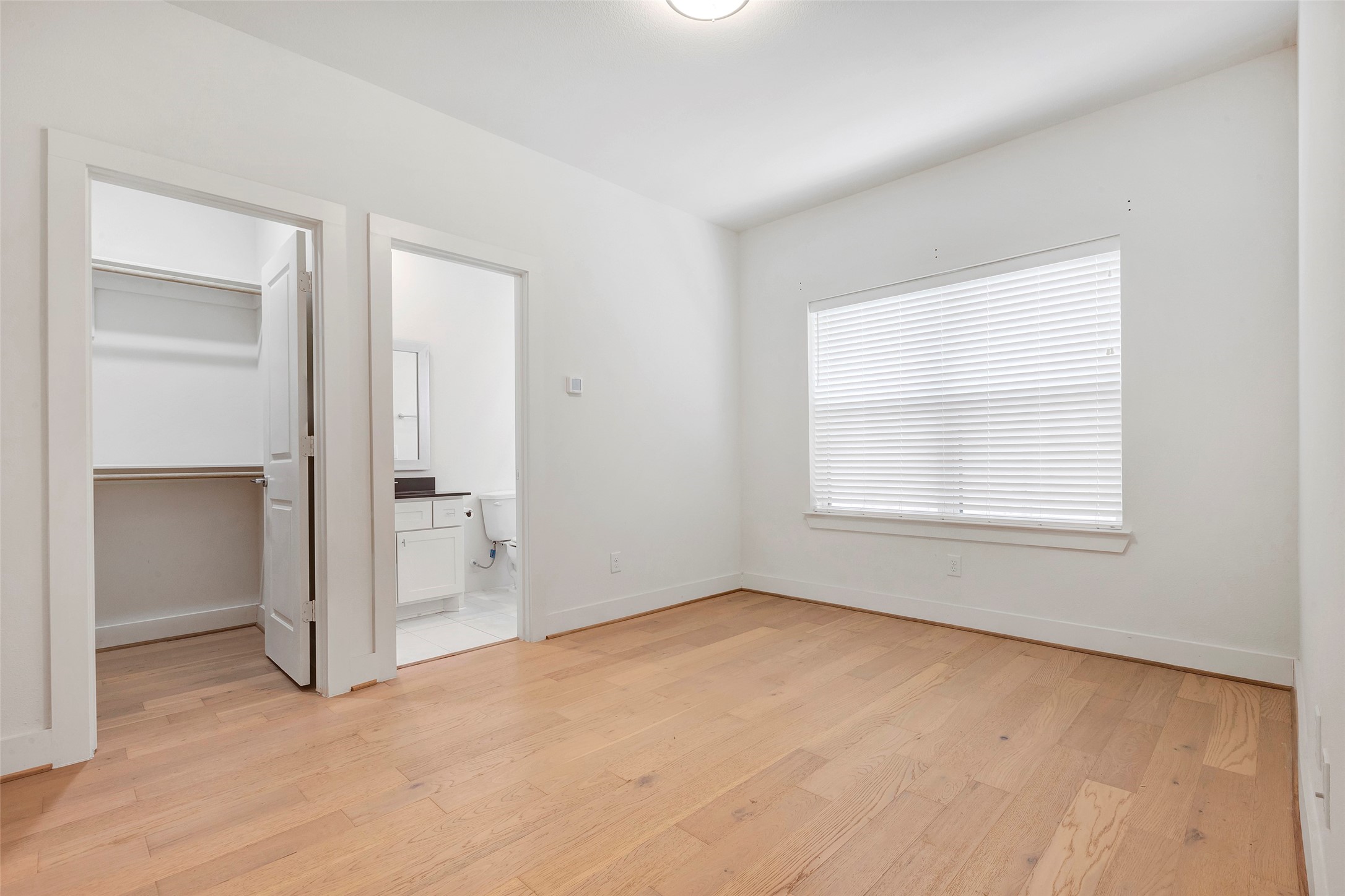 1740 Ojeman Point Lane Houston, TX 77055 - Photo 2 of 20 an empty room with windows