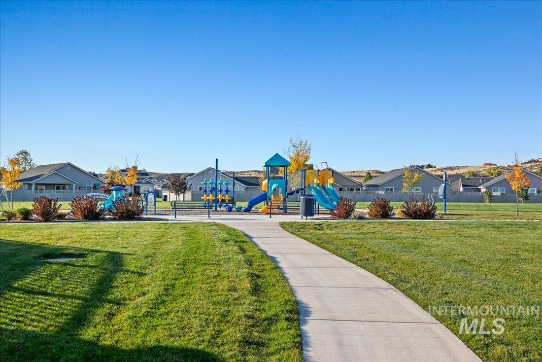 3174 North Greengate Way Star, ID 83669 - Photo 23 of 35 Community play area with a residential view and a lawn