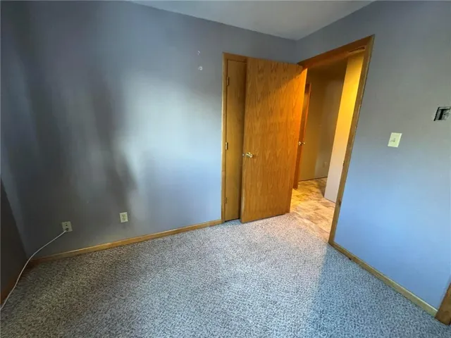 a view of an empty room with window