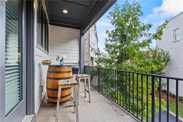 a table and chairs in front of a door