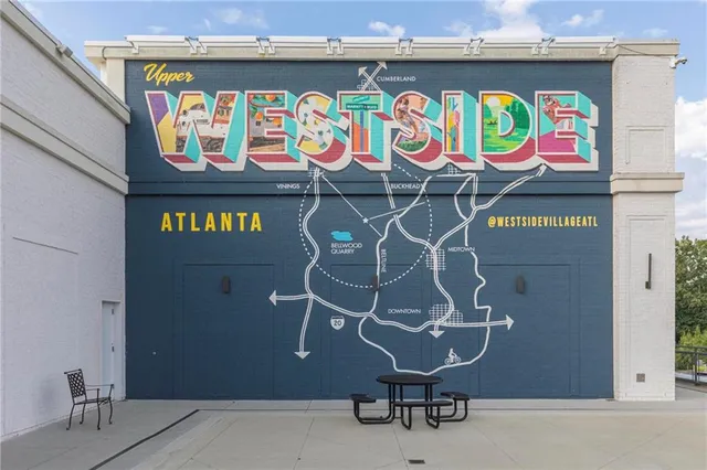 a room with stainless steel appliances and cabinets