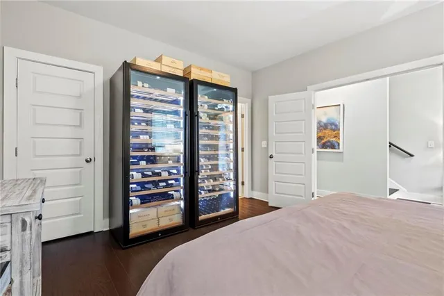 a bedroom with a bed and a cabinets