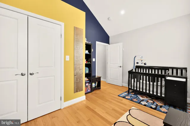 a bedroom with windows