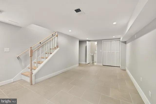 a view of an entryway with stairs