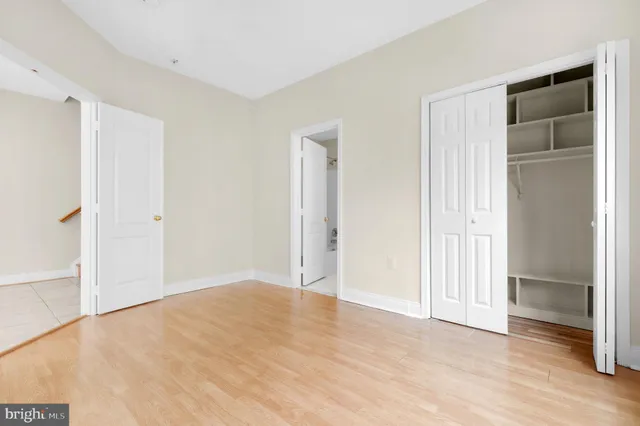 a view of a dining room with furniture wooden floor and chandelier