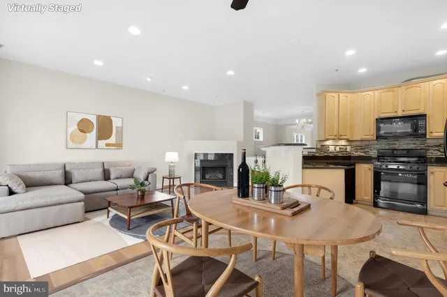 a balcony with wooden floor and fence