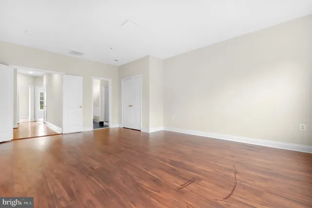 a bathroom with a sink toilet and a mirror