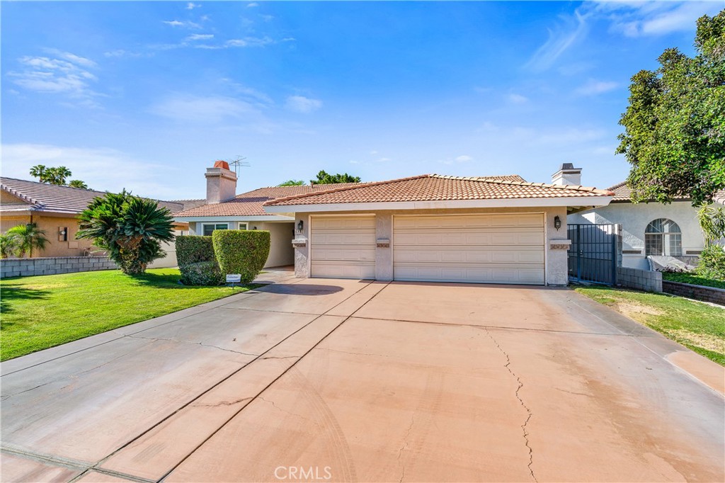 68920 Concepcion Road Cathedral City, CA 92234 - Photo 2 of 35 a view of a house with a yard