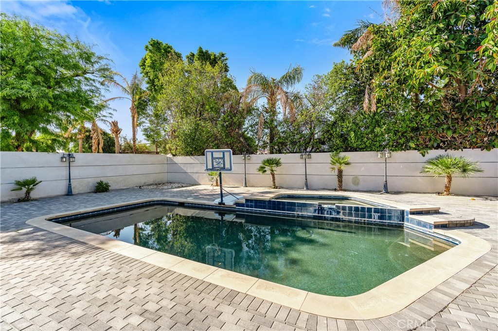 68920 Concepcion Road Cathedral City, CA 92234 - Photo 27 of 35 a view of a swimming pool with a patio