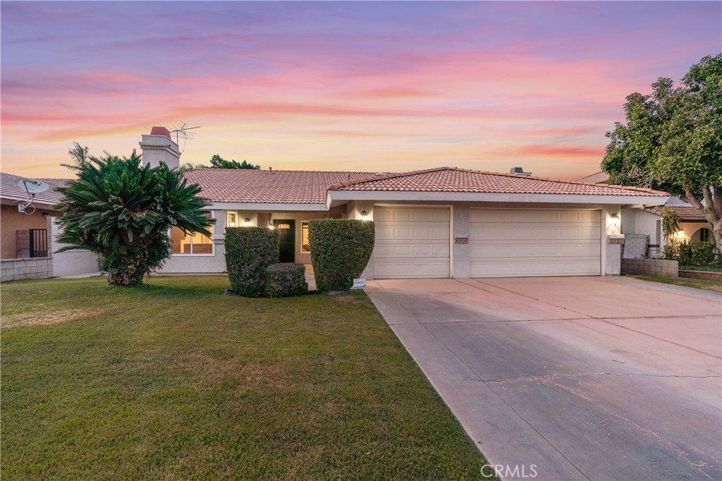 68920 Concepcion Road Cathedral City, CA 92234 - Photo 29 of 35 a front view of a house with a yard and garage