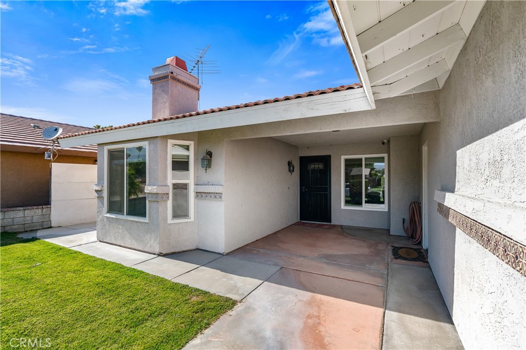 68920 Concepcion Road Cathedral City, CA 92234 - Photo 5 of 35 a view of a house with a porch