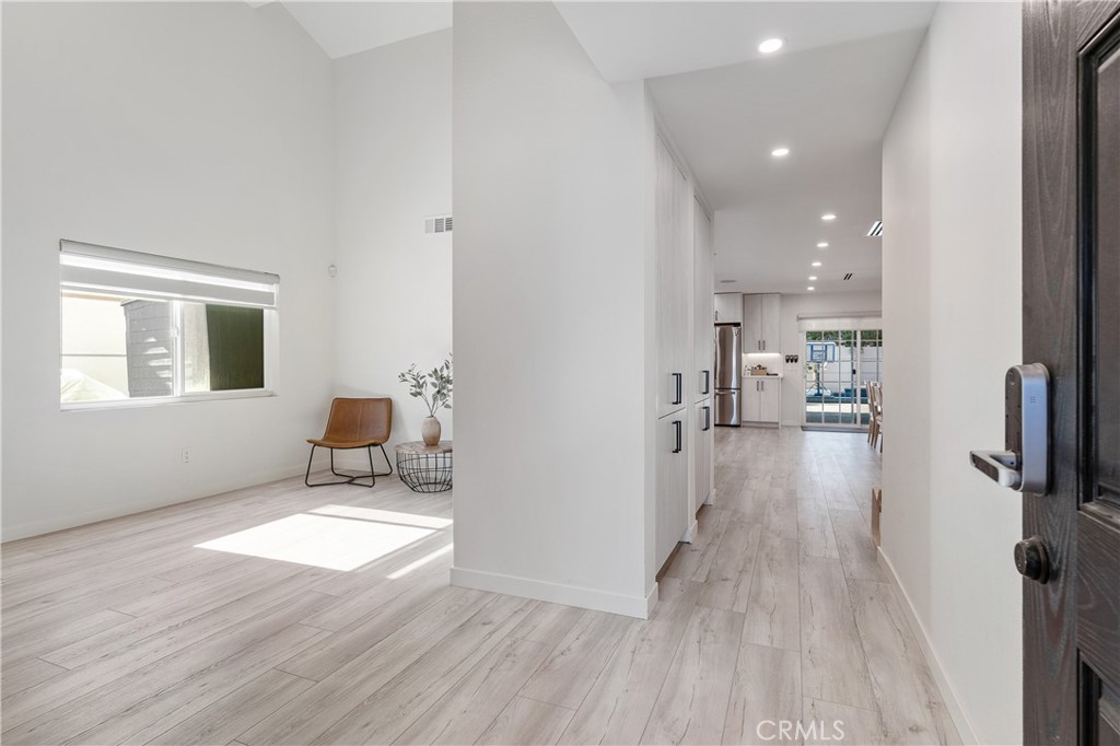 68920 Concepcion Road Cathedral City, CA 92234 - Photo 6 of 35 a view of a living room hardwood floor and a kitchen