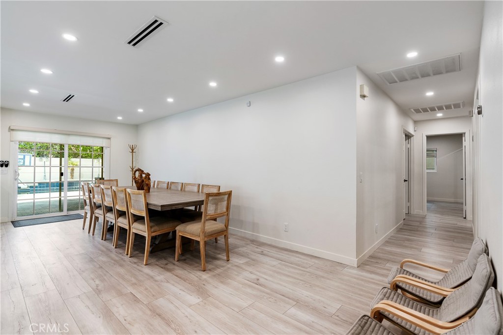 68920 Concepcion Road Cathedral City, CA 92234 - Photo 10 of 35 a dining room with furniture and wooden floor