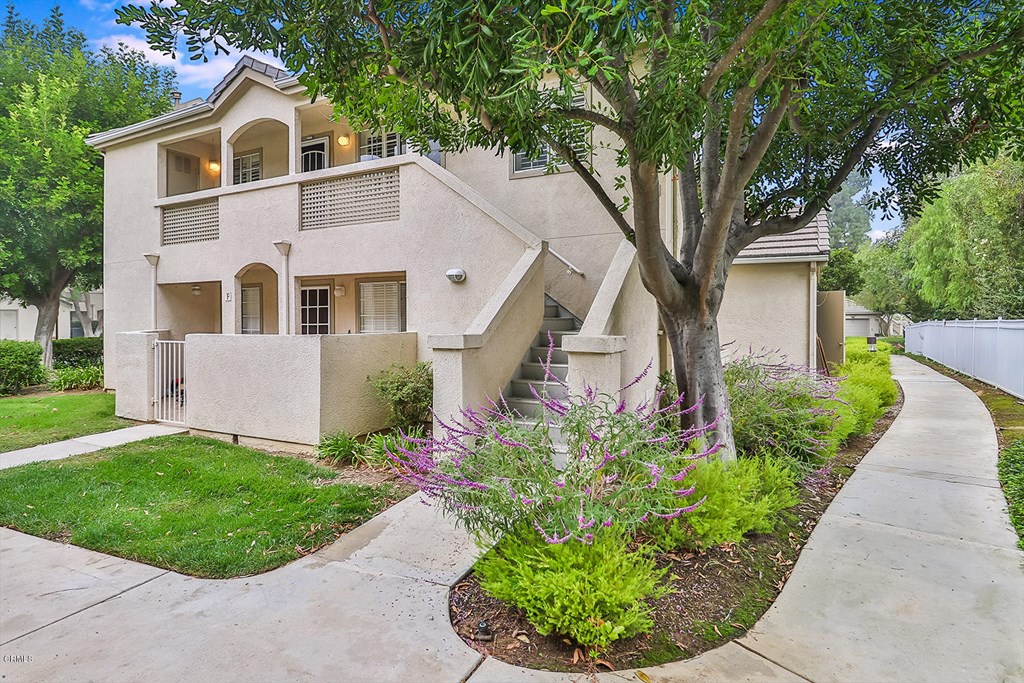 1175 G Fitzgerald Road, Unit G Simi Valley, CA 93065 - Photo 1 of 1 a front view of a house with a garden