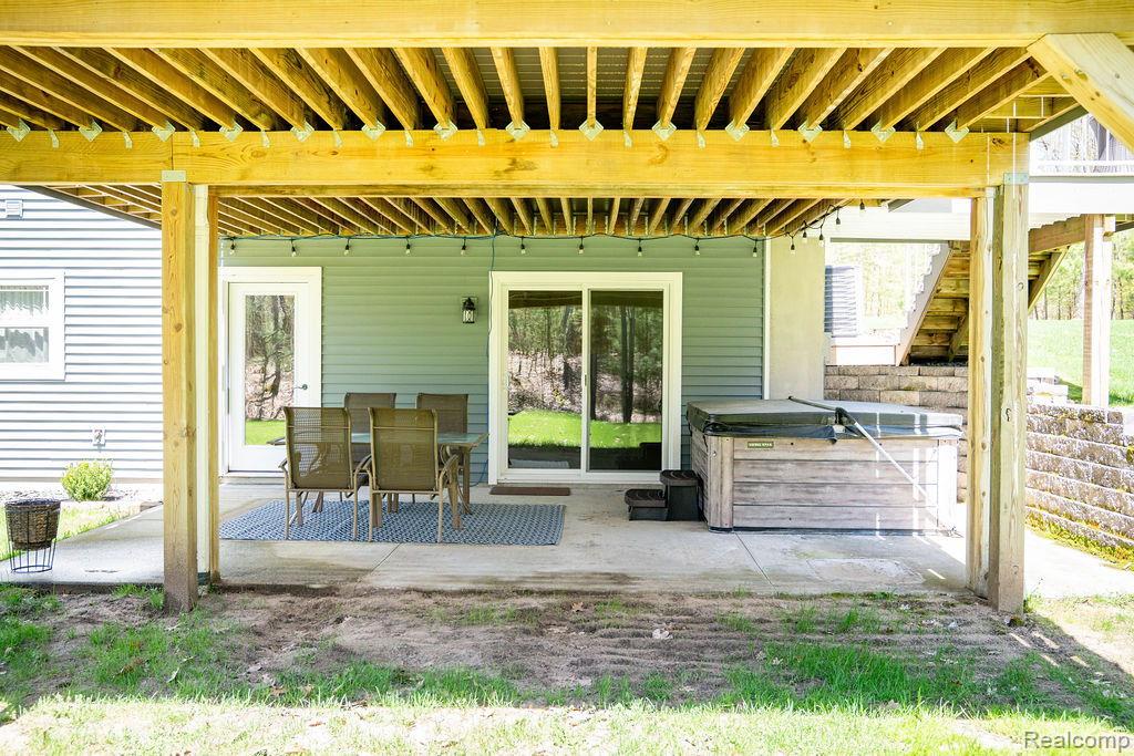 101 Highview Road Traverse City, MI 49696 - Photo 13 of 88 View of patio with a hot tub