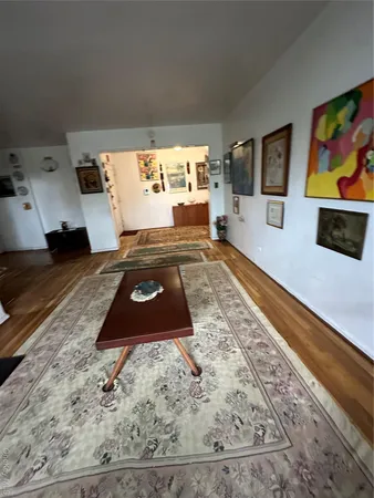 a living room with couch and a flat screen tv