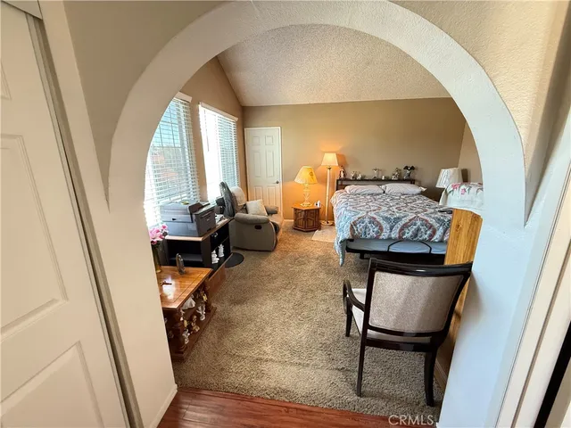 a view of a livingroom with furniture