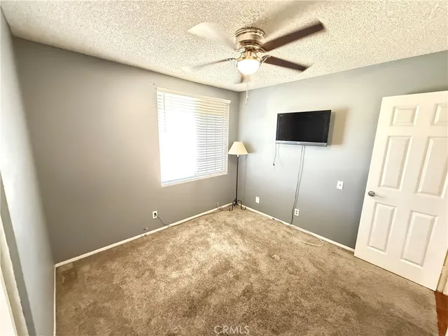 a view of a livingroom with a flat screen tv