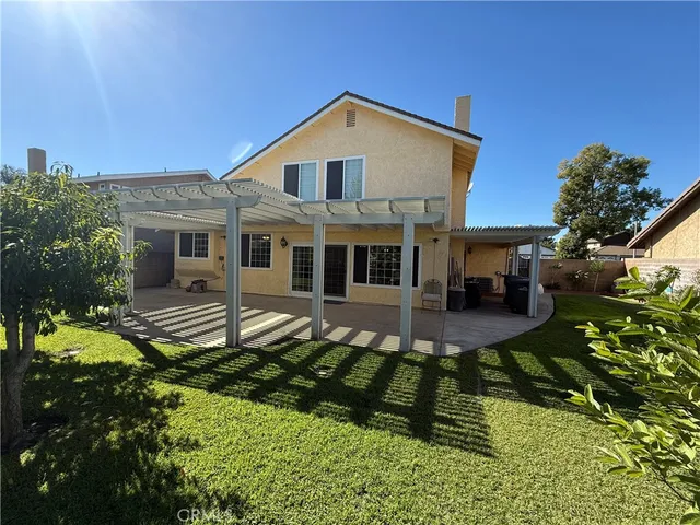 a view of a backyard of the house