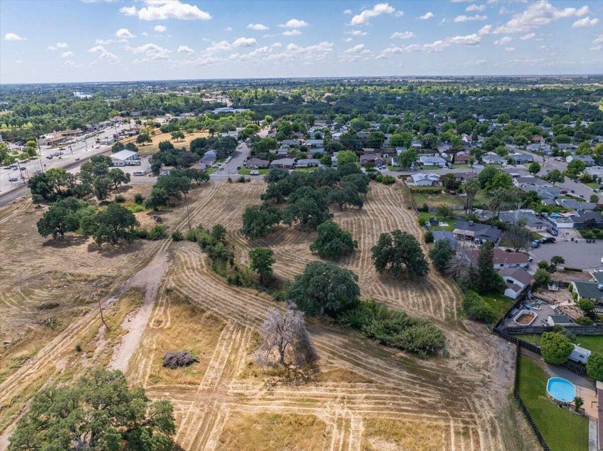 245 Walton Avenue Red Bluff, CA 96080 - Photo 16 of 22 an aerial view of a houses with a yard