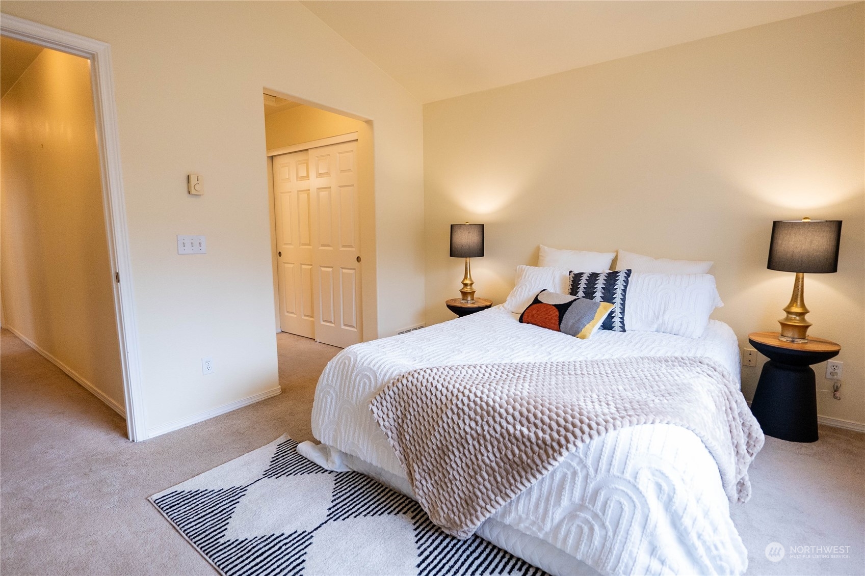 559 Elma Place Northeast Renton, WA 98059 - Photo 18 of 30 a bedroom with a bed and wooden floor