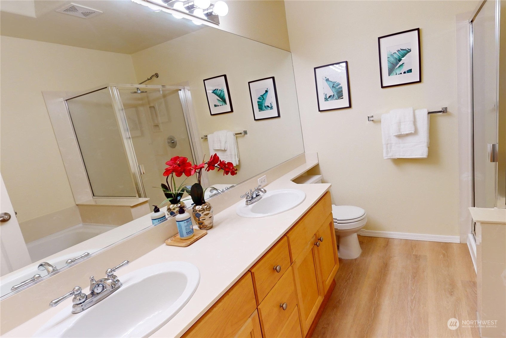 559 Elma Place Northeast Renton, WA 98059 - Photo 20 of 30 a bathroom with a sink mirror and a toilet