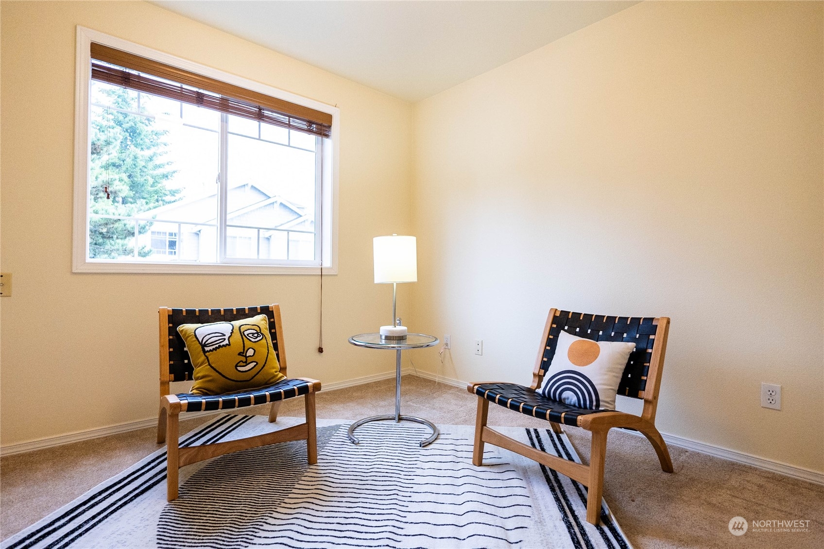 559 Elma Place Northeast Renton, WA 98059 - Photo 23 of 30 a living room with furniture and a window