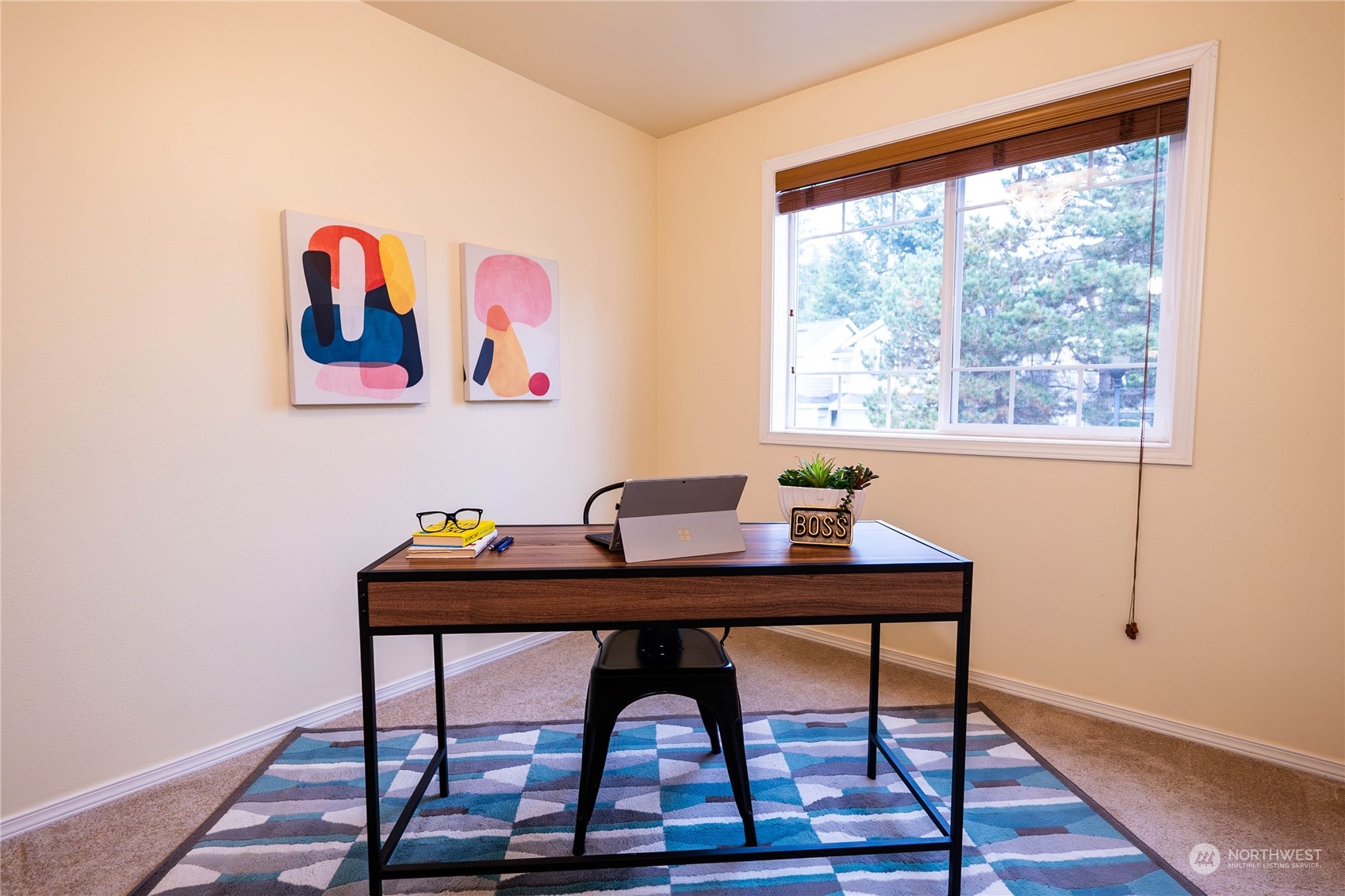 559 Elma Place Northeast Renton, WA 98059 - Photo 26 of 30 a view of a workspace with furniture and wooden floor