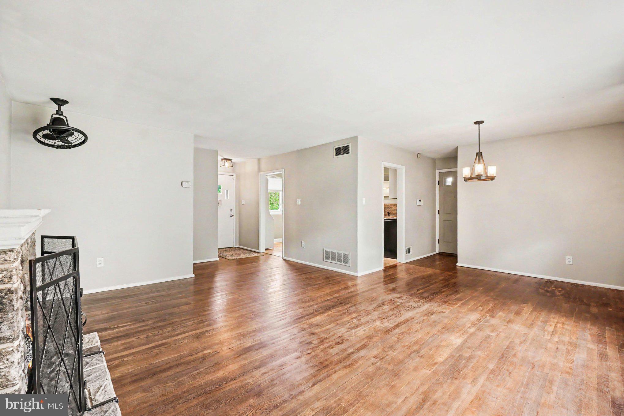 201 Mountain Road Fallston, MD 21047 - Photo 7 of 35 a view of a livingroom with wooden floor